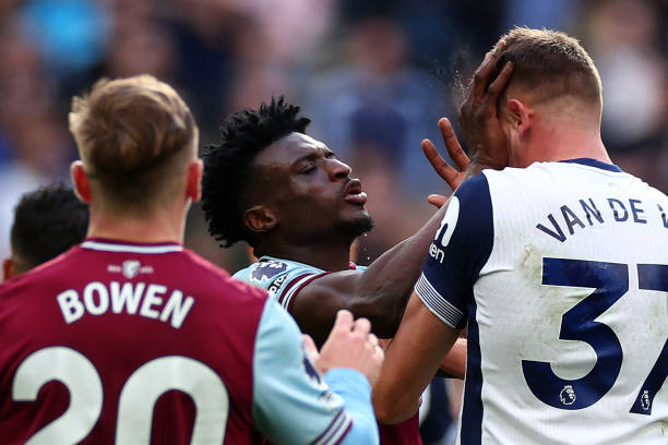 Mohammed Kudus of West Ham United clashes with Micky van de Ven of Tottenham Hotspur