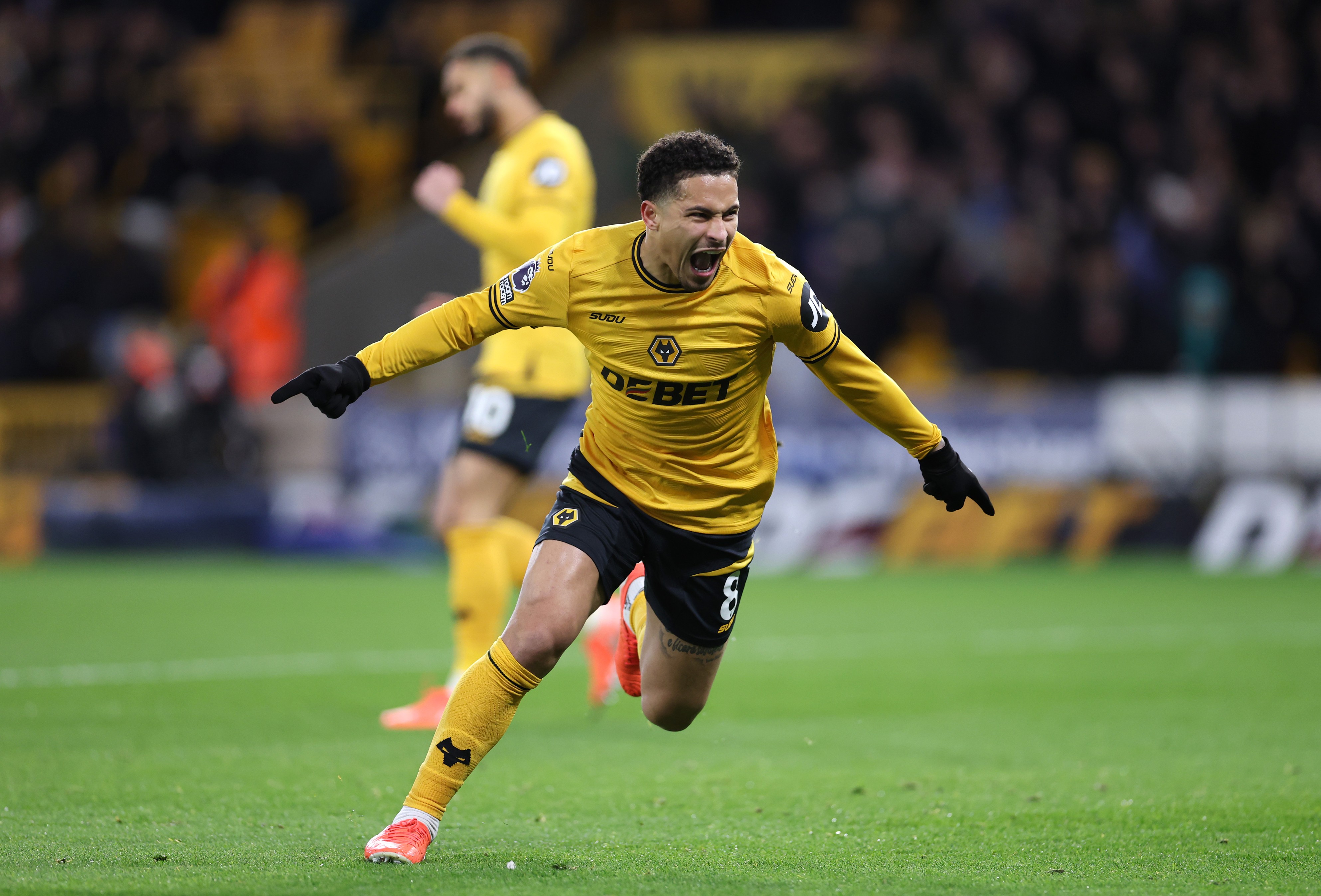 Joao Gomes celebrates a goal for Wolves