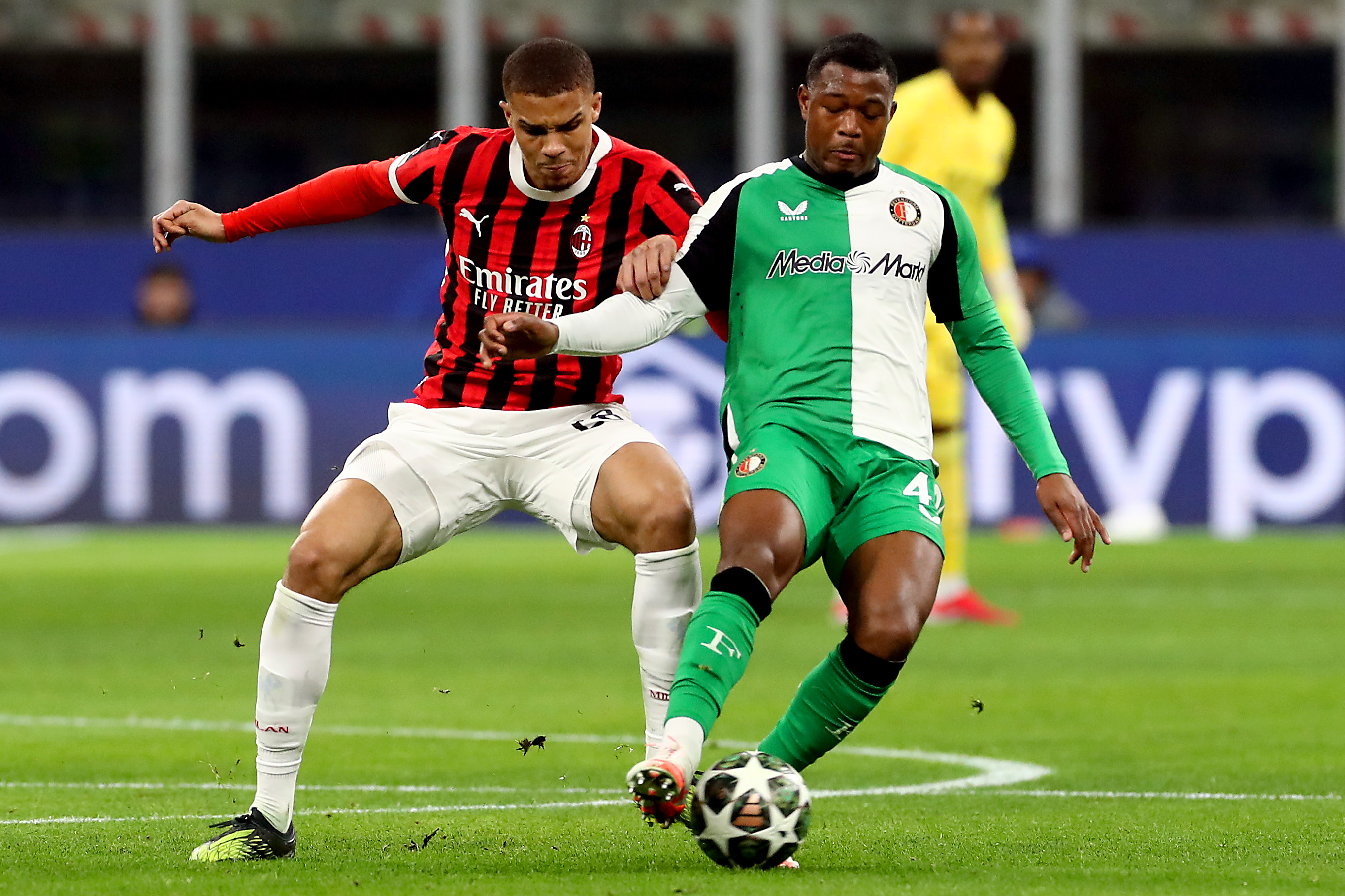 Malick Thiaw vies for the ball