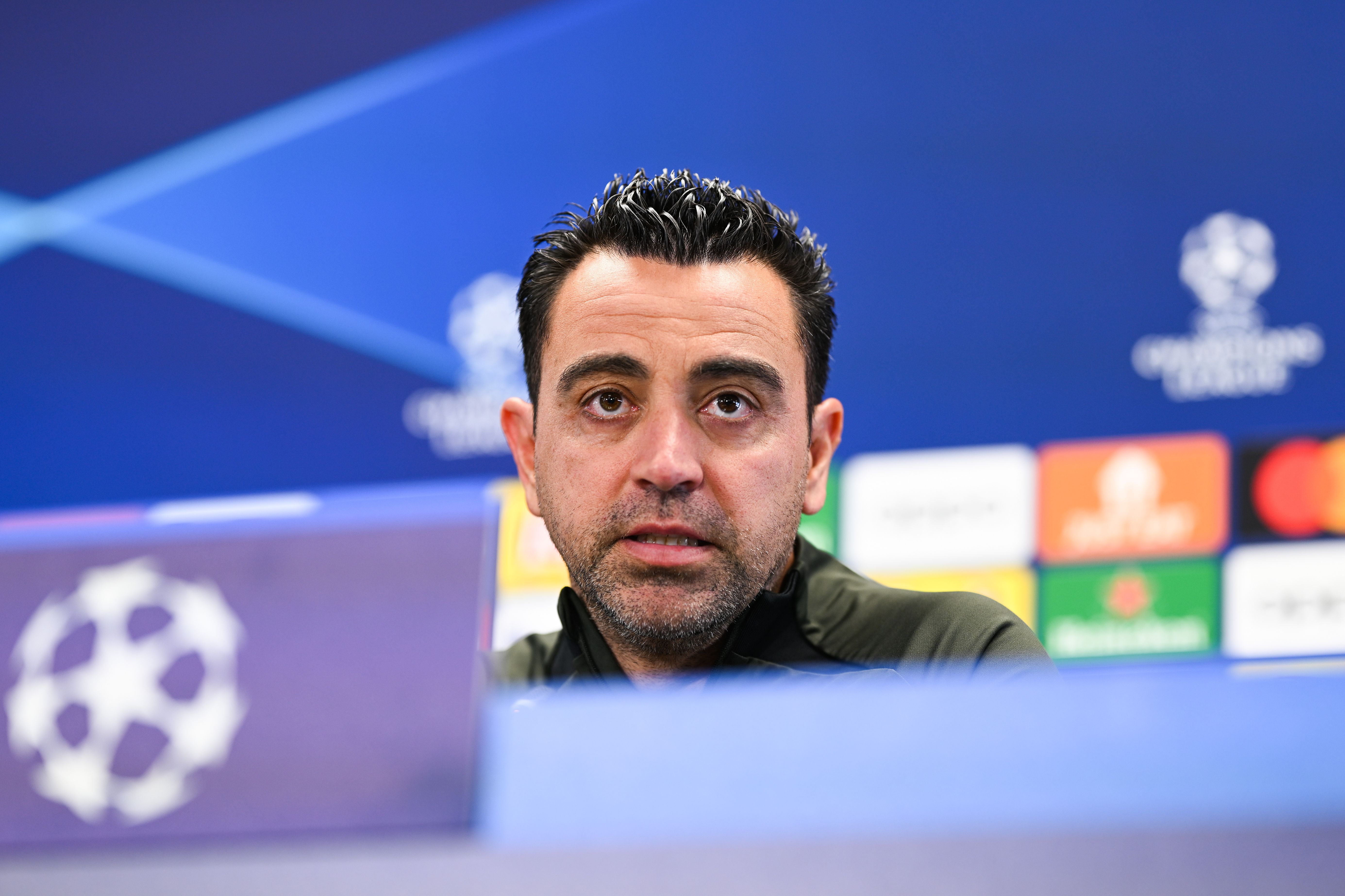 Xavi hernandez looks on