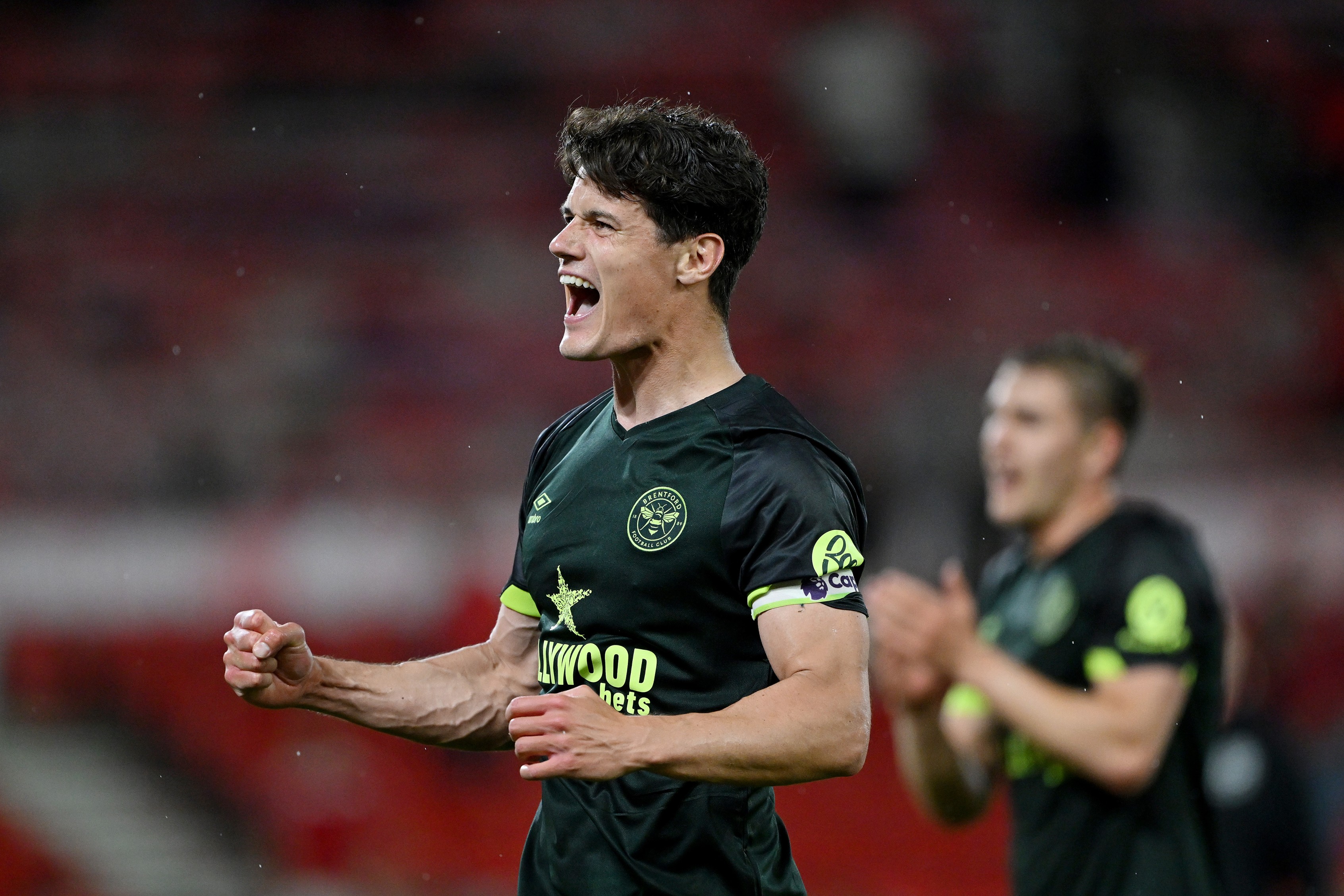 Christian Norgaard of Brentford celebrates victory