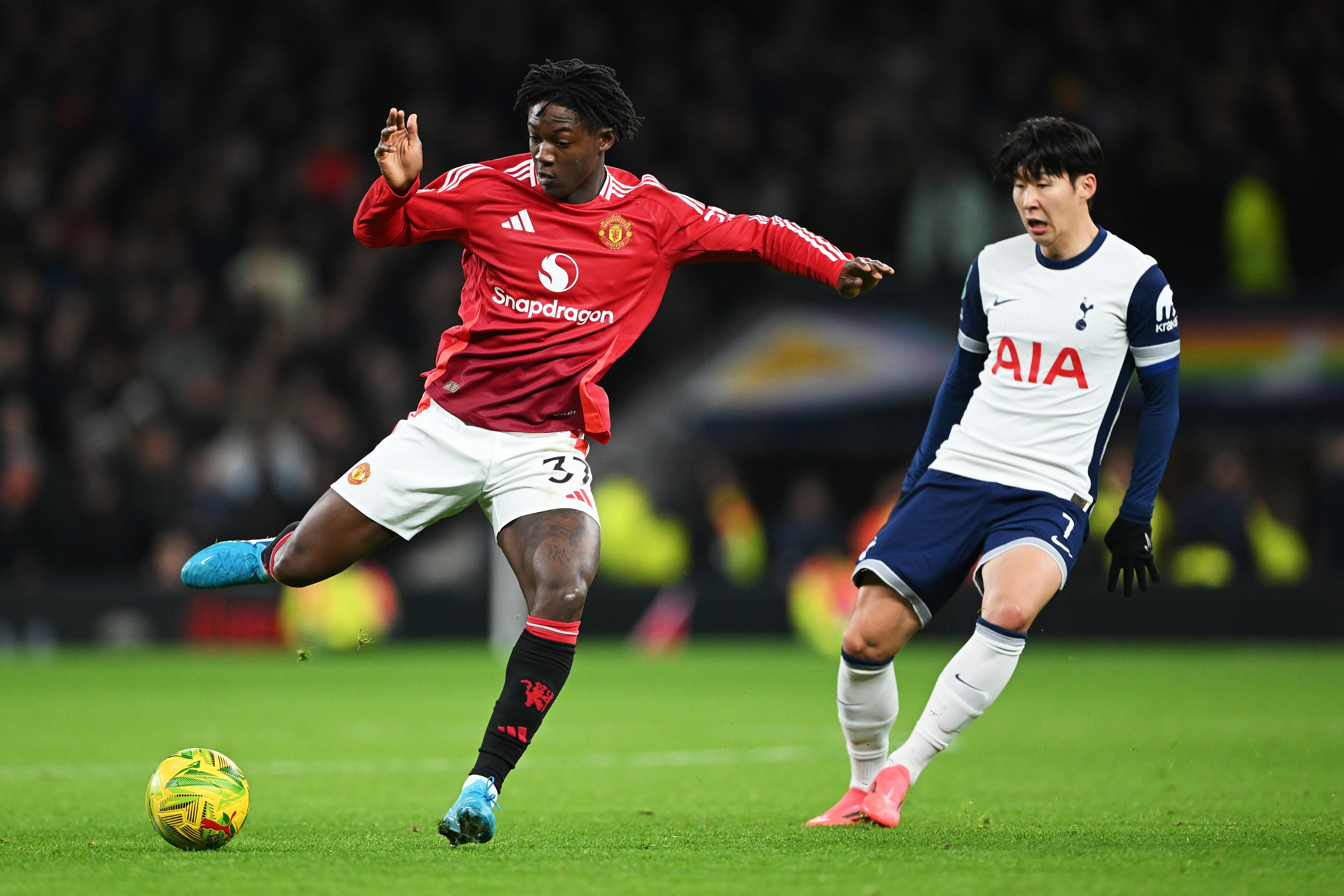 Kobbie Mainoo in action against Tottenham