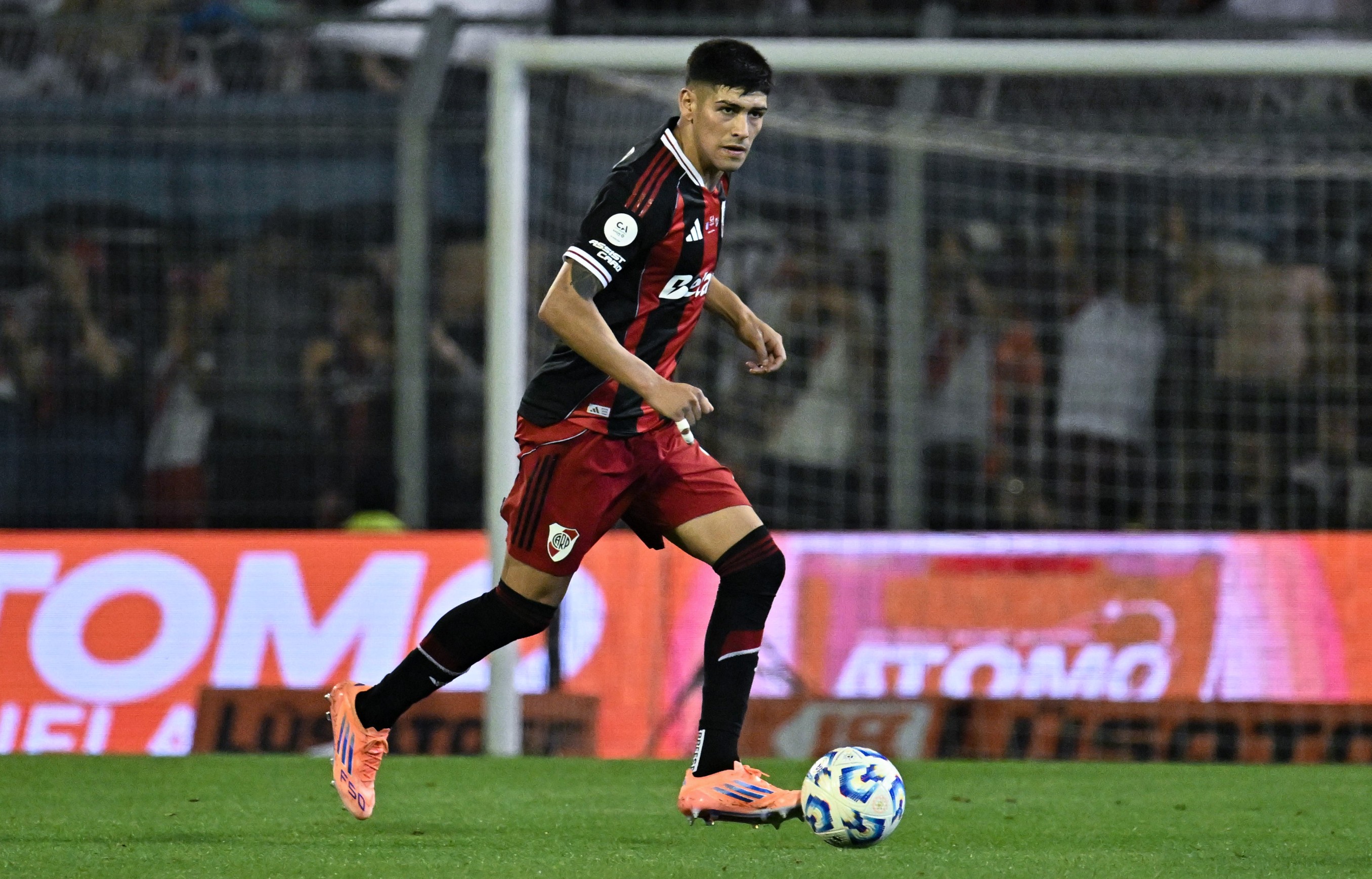 Lautaro Rivero of River Plate runs with the ball