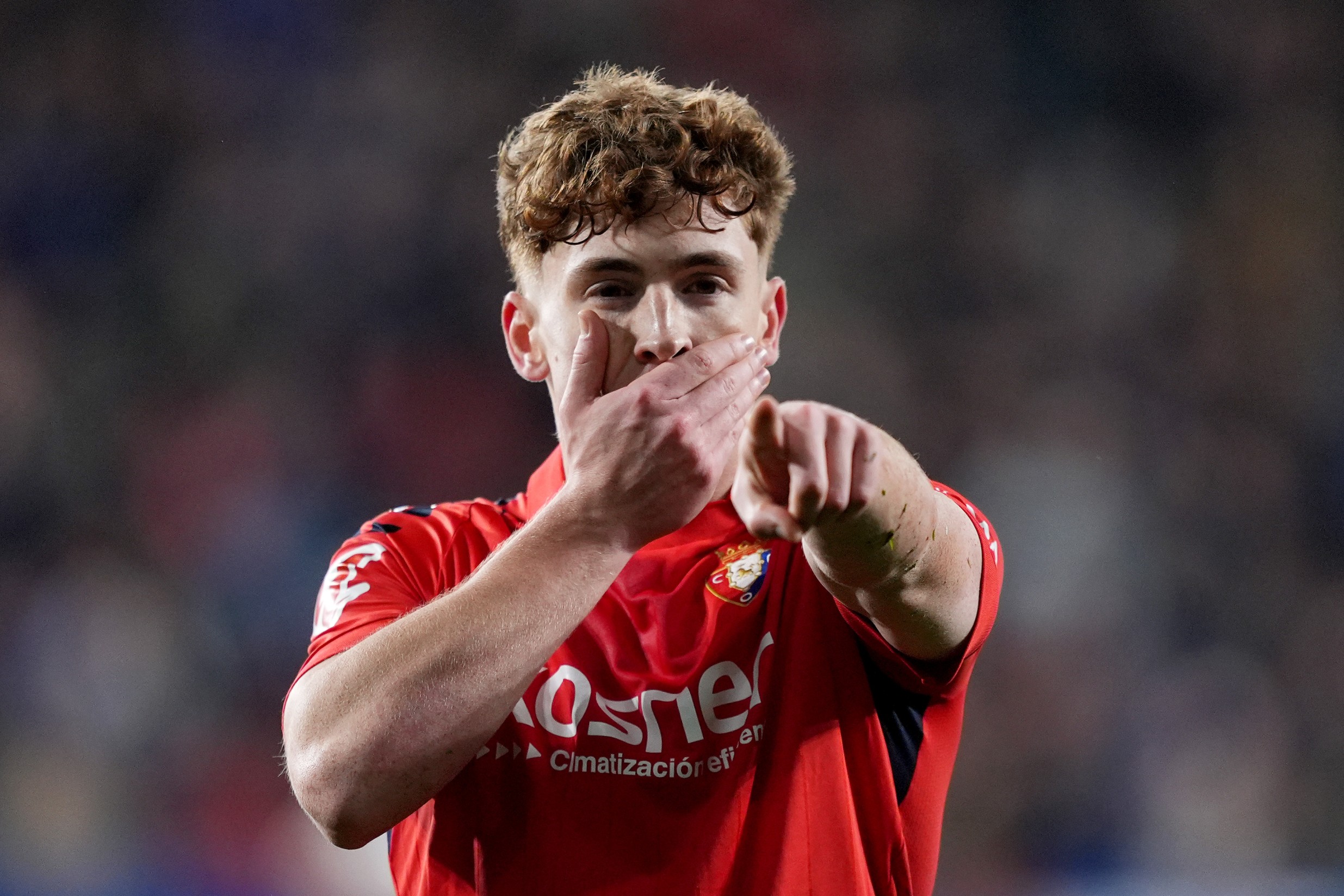 Victor Munoz of CA Osasuna celebrates scoring