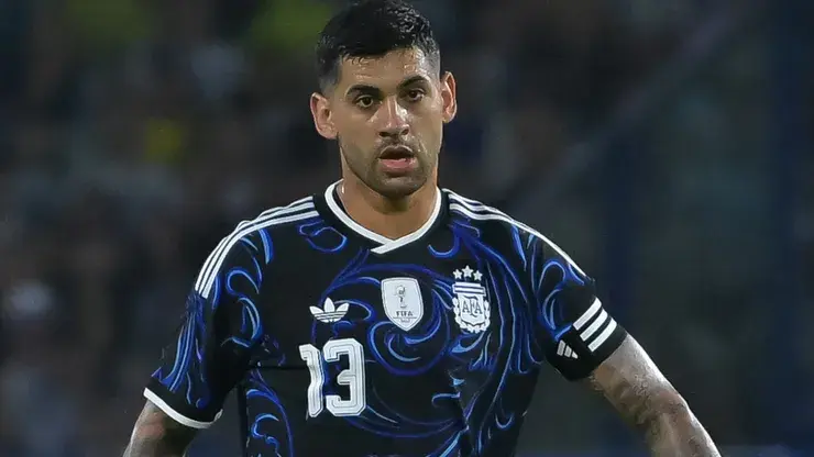 Cristian Romero wearing Argentina's football kit during a match.