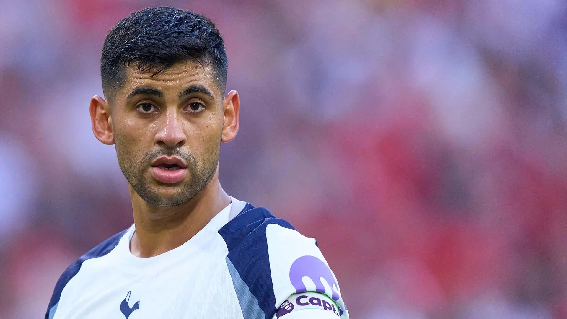 Cristian Romero in a Tottenham Hotspur jersey during a match.