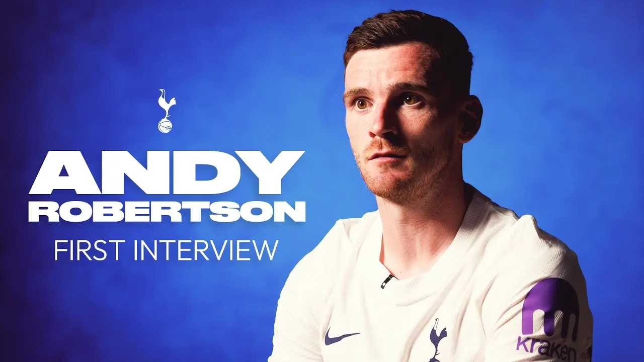 Andy Robertson wearing a white Tottenham Hotspur kit against a blue background with text