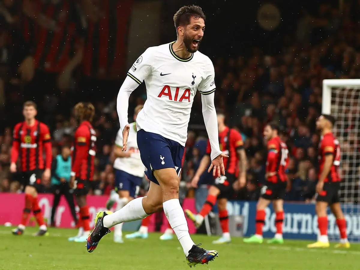 Rodrigo Bentancur celebrating in a white Tottenham Hotspur kit during a match