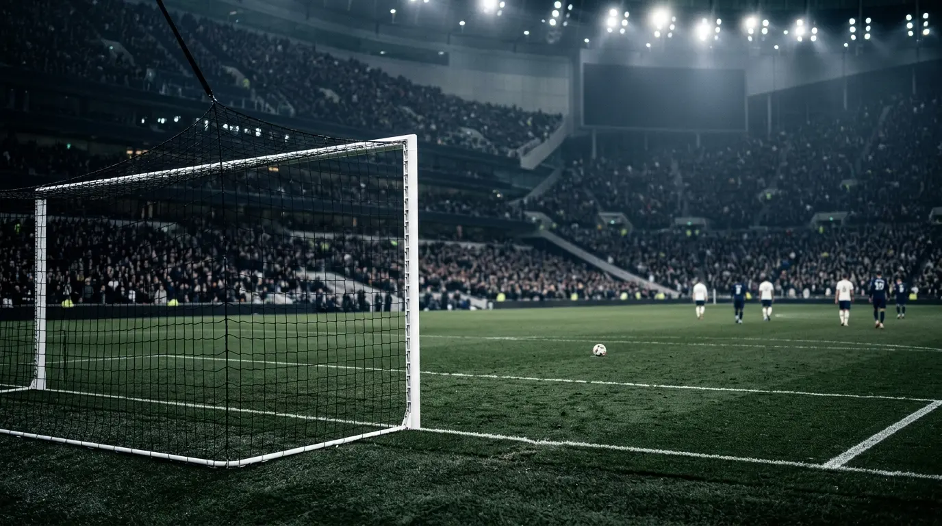 Empty goal under stadium lights symbolising Tottenham's historic Premier League scoring drought after the Everton draw